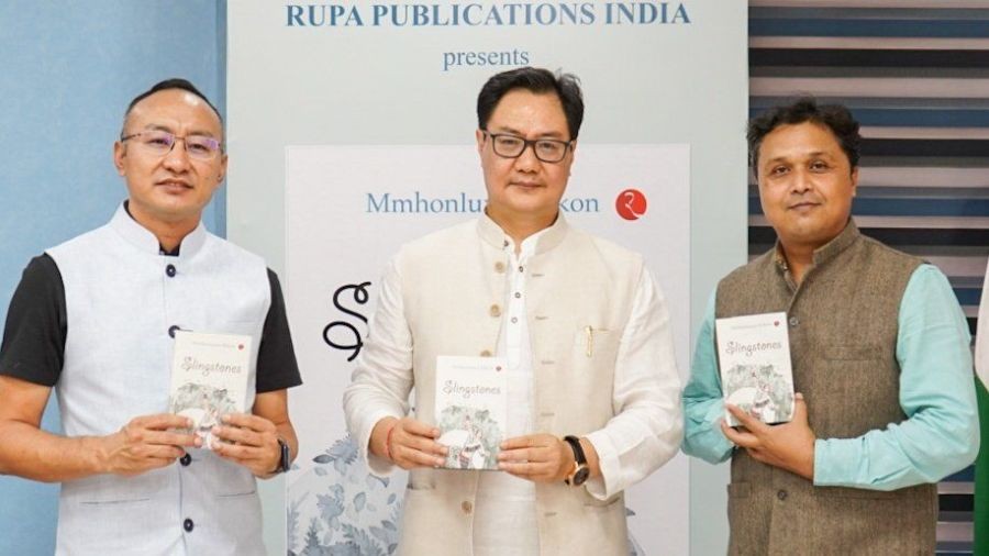 Union Minister of Law and Justice, Kiren Rijiju, Advisor Mmhonlumo Kikon and Executive Editor of Rupa Publications, Dibakar Ghosh during the release of Slingstones, Kikon’s third poetry collection in New Delhi on September 10.